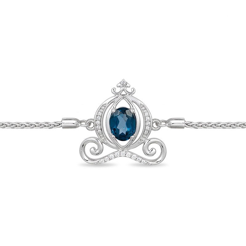 Previously Owned - Enchanted Disney Cinderella Oval Blue Topaz and 0.085 CT. T.W. Diamond Carriage Bolo Bracelet