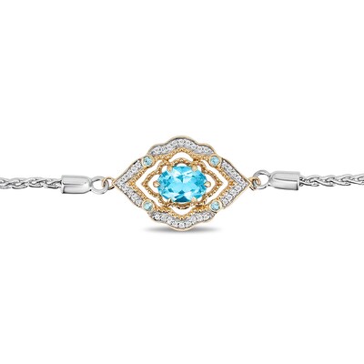 Previously Owned - Enchanted Disney Aladdin Oval Swiss Blue Topaz and 0.065 CT. T.W. Diamond Bolo Bracelet