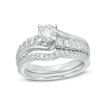 Previously Owned - 1.20 CT. T.W. Diamond Bypass Bridal Set in 14K White Gold (I/I2)