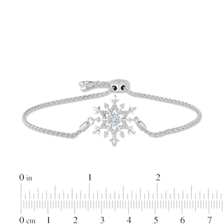 Previously Owned - Enchanted Disney Elsa 4.0mm Aquamarine and 0.15 CT. T.W. Diamond Snowflake Bolo Bracelet - 9.0"