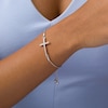 Thumbnail Image 1 of Previously Owned - 0.10 CT. T.W. Diamond Sideways Cross Bolo Bracelet in Sterling Silver - 9.5"