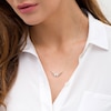 Previously Owned - Wonder Woman™ Collection 0.115 CT. T.W. Diamond Symbol Necklace in 10K Gold