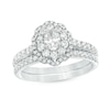 Thumbnail Image 0 of Previously Owned - 1.00 CT. T.W. Oval Diamond Double Scallop Frame Bridal Set in 14K White Gold