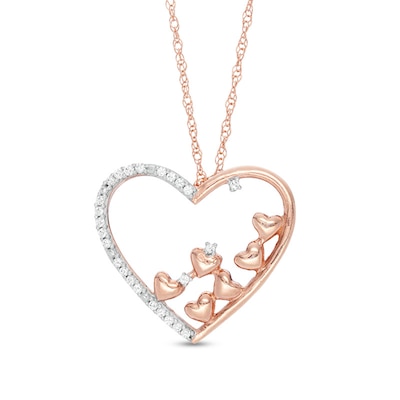 Previously Owned - 0.10 CT. T.W. Diamond Scatter Tilted Heart Pendant in 10K Rose Gold