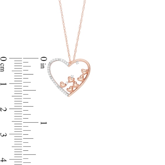 Previously Owned - 0.10 CT. T.W. Diamond Scatter Tilted Heart Pendant in 10K Rose Gold