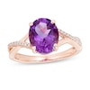 Thumbnail Image 0 of Previously Owned - Oval Amethyst and 0.05 CT. T.W. Diamond Twist Shank Ring in 10K Rose Gold