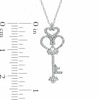 Previously Owned - 0.16 CT. T.W. Diamond Crowned Heart-Top Key Pendant in 10K White Gold