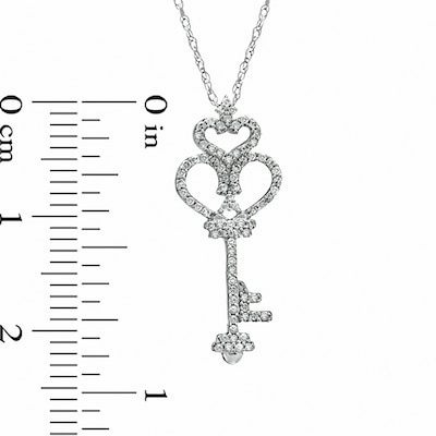 Previously Owned - 0.16 CT. T.W. Diamond Crowned Heart-Top Key Pendant in 10K White Gold