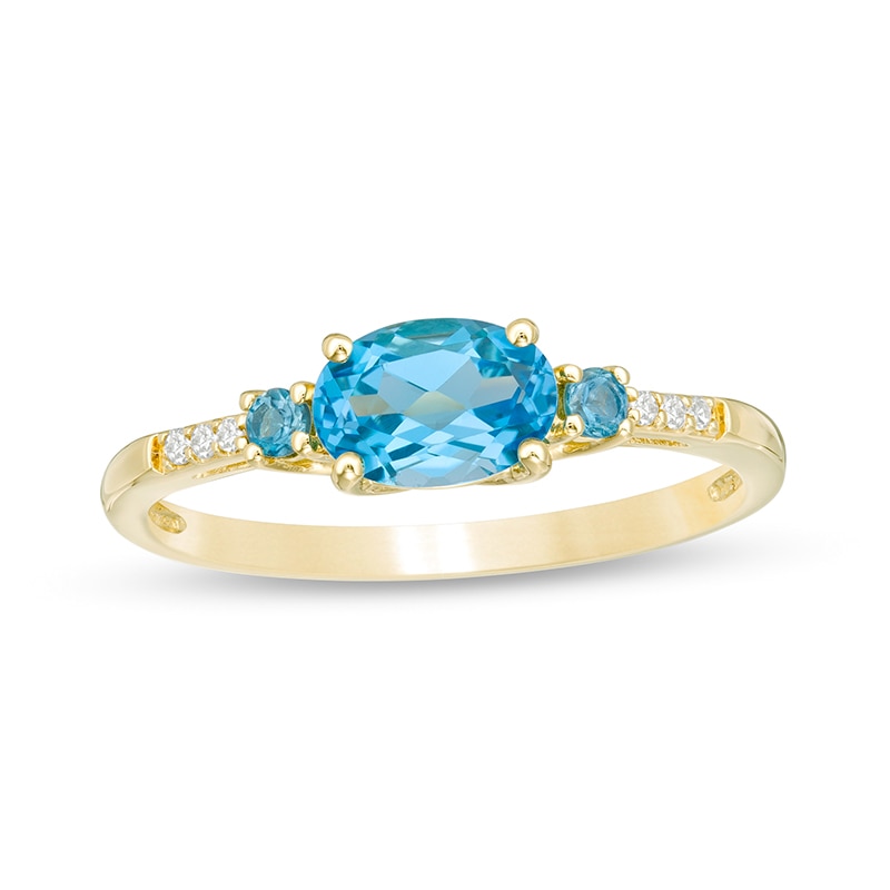Previously Owned - Sideways Oval Blue Topaz and Diamond Accent Ring in 10K Gold|Peoples Jewellers