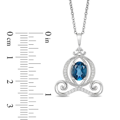 Previously Owned - Enchanted Disney Cinderella Oval London Blue Topaz and 0.085 CT. T.W. Diamond Carriage Pendant