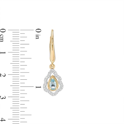 Previously Owned - Pear-Shaped Swiss Blue Topaz and 0.18 CT. T.W. Diamond Scallop Frame Drop Earrings in 10K Gold