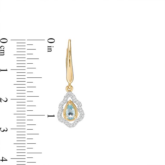 Previously Owned - Pear-Shaped Swiss Blue Topaz and 0.18 CT. T.W. Diamond Scallop Frame Drop Earrings in 10K Gold