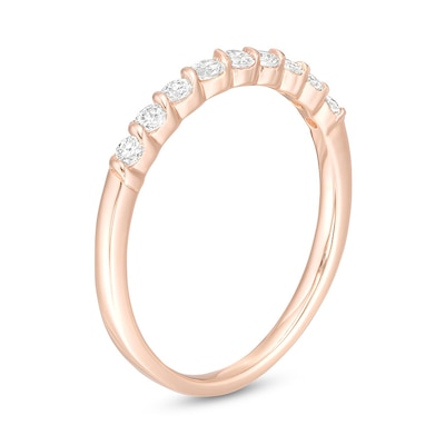 Previously Owned - 0.30 CT. T.W. Diamond Nine Stone Twist Anniversary Band in 10K Rose Gold