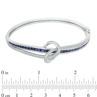 Previously Owned - Princess-Cut Lab-Created Blue and White Sapphire Loose Knot Bangle in Sterling Silver