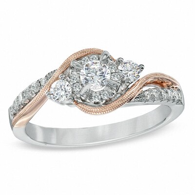 Previously Owned - 0.50 CT. T.W. Diamond Three Stone Swirl Engagement Ring in 10K Two-Tone Gold