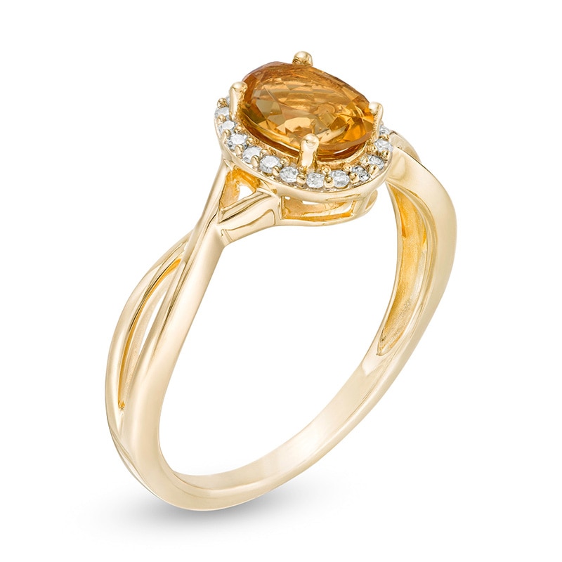 Previously Owned - Oval Citrine and 0.08 CT. T.W. Diamond Frame Twist ...