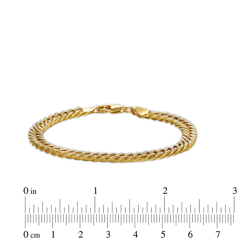 Previously Owned - 6.0mm Diamond-Cut Curb Chain Bracelet in Hollow 14K Two-Tone Gold - 7.25"