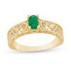 Previously Owned - Oval Emerald and 0.05 CT. T.W. Diamond Scroll Open Shank Vintage-Style Ring in 10K Gold