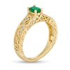 Previously Owned - Oval Emerald and 0.05 CT. T.W. Diamond Scroll Open Shank Vintage-Style Ring in 10K Gold