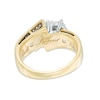 Previously Owned - 0.75 CT. T.W. Diamond Past Present Future® Three Stone Bypass Engagement Ring in 10K Gold