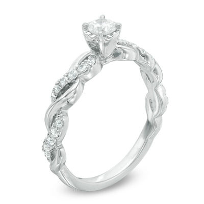 Previously Owned - 0.33 CT. T.W. Diamond Twist Shank Engagement Ring in 10K White Gold