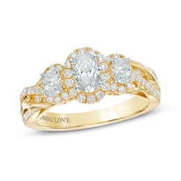 Previously Owned - Vera Wang Love Collection 0.95 CT. T.W. Oval Diamond Three Stone Engagement Ring in 14K Gold