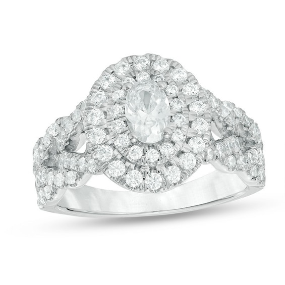 Previously Owned - Love's Destiny by Peoples 1.50 CT. T.W. Oval Diamond Engagement Ring in 14K White Gold (I/SI2)