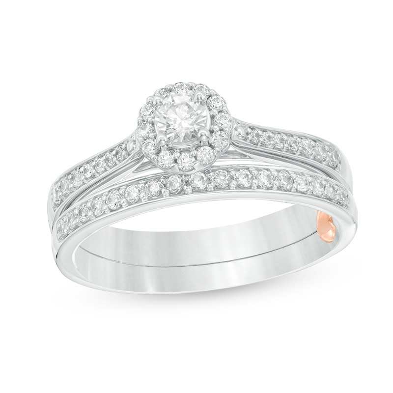 Previously Owned - Perfect Fit 0.50 CT. T.W. Diamond Frame Interlocking Bridal Set in 10K White Gold|Peoples Jewellers