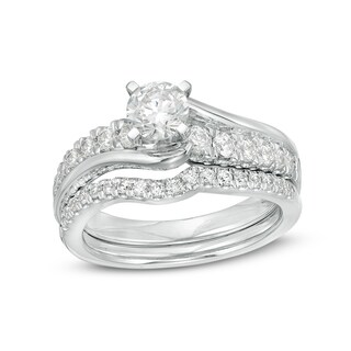 Previously Owned - 1.20 CT. T.W.  Diamond Bypass Bridal Set in 14K White Gold (I/I2)