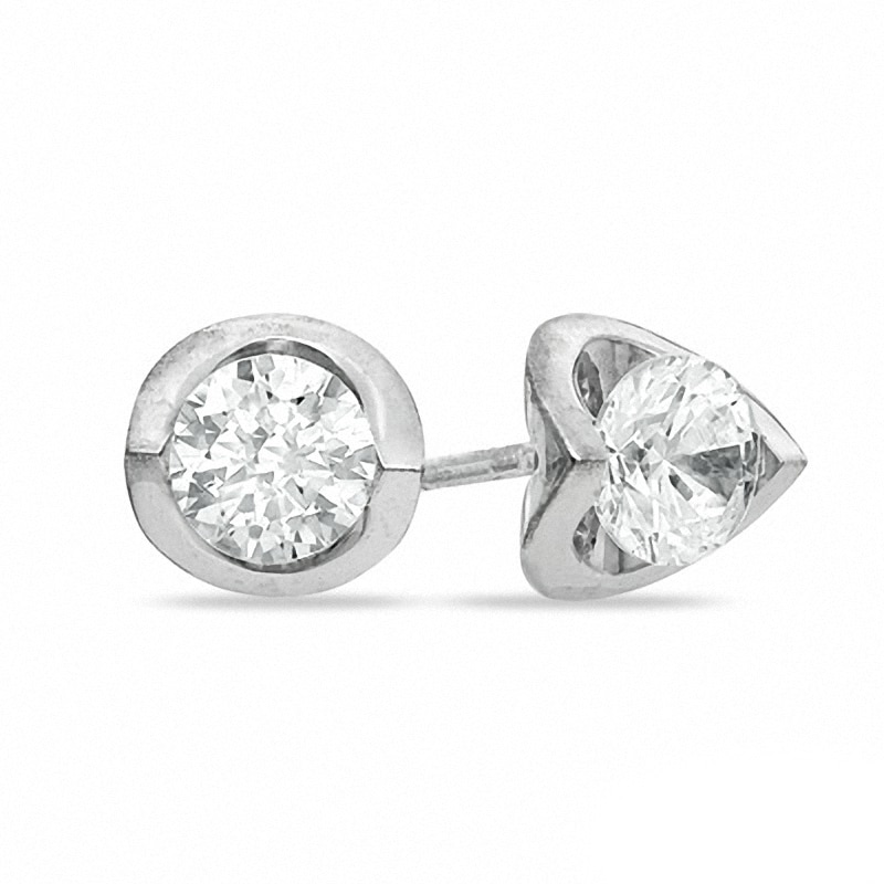 Main Image 1 of Previously Owned - 0.20 CT. T.W.  Diamond Tension-Set Earrings in 14K White Gold (I/I2)