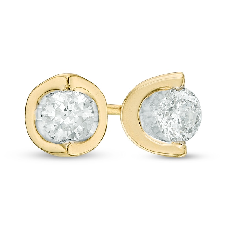 Main Image 1 of Previously Owned - 0.20 CT. T.W. Diamond Solitaire Tension-Set Earrings in 14K Gold (I/I2)