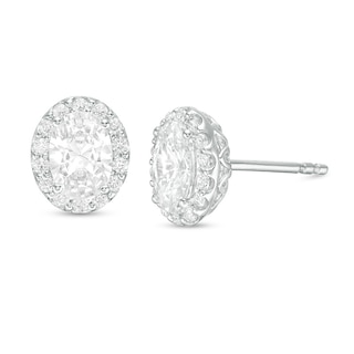 Previously Owned - 1.45 CT. T.W. Oval Diamond Frame Stud Earrings in 14K White Gold (I/SI2)