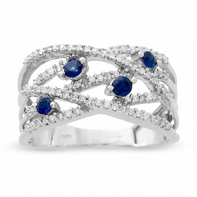 Previously Owned - Blue Sapphire and 0.18 CT. T.W. Diamond Orbit Band in 14K White Gold