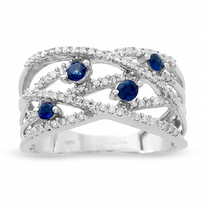 Previously Owned - Blue Sapphire and 0.18 CT. T.W. Diamond Orbit Band in 14K White Gold|Peoples Jewellers