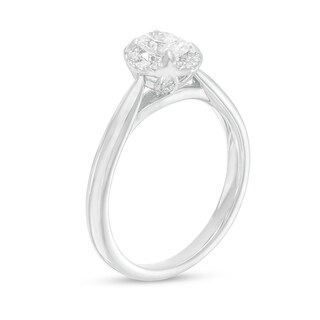 Previously Owned - 0.62 CT. T.W. Oval Diamond Frame Engagement Ring in 14K White Gold (I/I2)