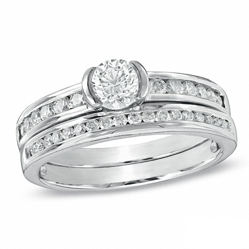 Previously Owned - 1.00 CT. T.W. Canadian Diamond Bridal Set in 14K White Gold (I/I1)|Peoples Jewellers