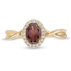 Thumbnail Image 3 of Previously Owned - Oval Garnet and 0.08 CT. T.W. Diamond Frame Twist Shank Ring in 10K Gold