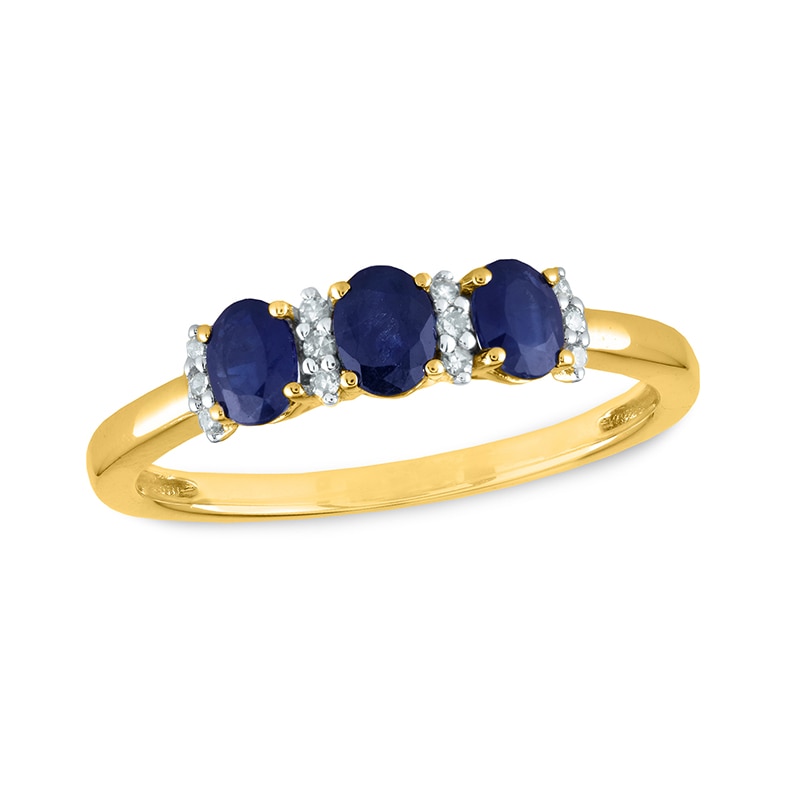 Previously Owned - Oval Blue Sapphire and 0.08 CT. T.W. Diamond Three Stone Ring in 14K Gold|Peoples Jewellers