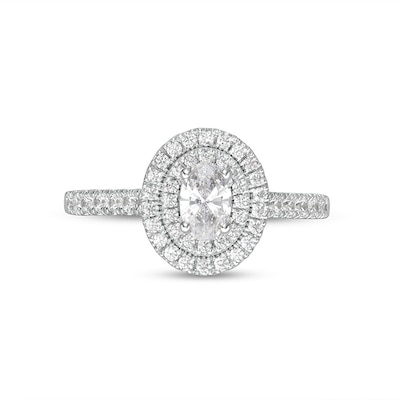 Previously Owned - 0.83 CT. T.W. Oval Diamond Double Frame Engagement Ring in 14K White Gold