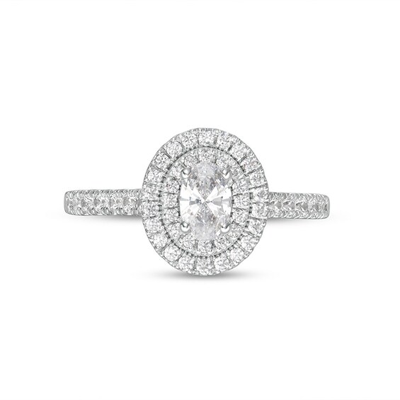 Previously Owned - 0.83 CT. T.W. Oval Diamond Double Frame Engagement Ring in 14K White Gold