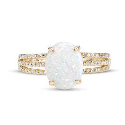 Previously Owned - Oval Lab-Created Opal and 0.145 CT. T.W. Diamond Triple Row Split Shank Ring in 10K Gold