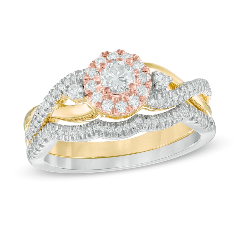 Previously Owned - 0.45 CT. T.W. Diamond Twist Bridal Set in 10K Tri-Tone Gold|Peoples Jewellers