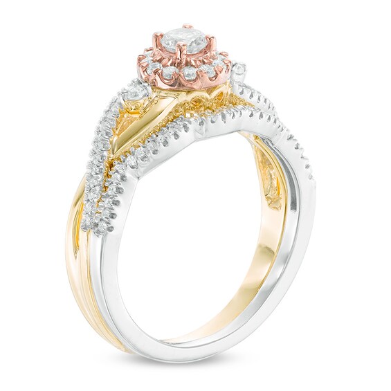 Previously Owned - 0.45 CT. T.W. Diamond Twist Bridal Set in 10K Tri-Tone Gold