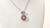 Unstoppable Love™ Diamond Accent Heart and Circle Pendant in Sterling Silver and 10K Rose Gold