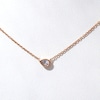 0.09 CT. Pear-Shaped Diamond Solitaire Necklace in 10K Rose Gold