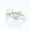 0.04 CT. T.W. Composite Diamond Heart "Love" Ring in Sterling Silver and 10K Gold