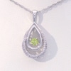 Unstoppable Love™ Peridot and 0.15 CT. T.W. Diamond Teardrop Pendant in Sterling Silver