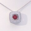 Unstoppable Love™ 5.0mm Garnet and 0.18 CT. T.W. Diamond Double Row Cushion Pendant in Sterling Silver