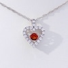 Unstoppable Love™ Garnet and Lab-Created White Sapphire Heart Pendant in Sterling Silver