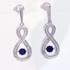 Unstoppable Love™ Lab-Created Blue Sapphire and 0.09 CT. T.W. Diamond Infinity Drop Earrings in Sterling Silver